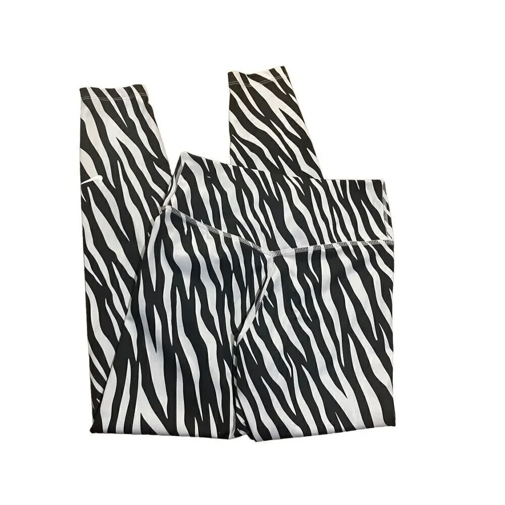 The Nike One Tight Fit Mid Rise zebra animal‎ print leggings 7/8 length S